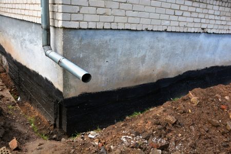 black pain on a foundation wall