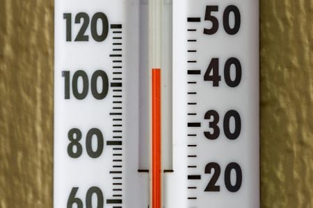 a white and black thermometer 