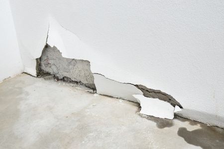 cracked wall with water damage